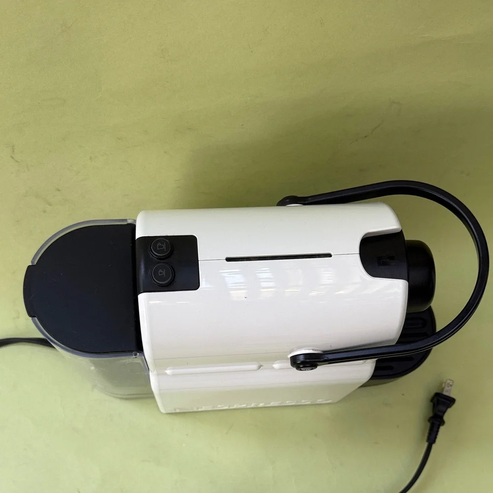 Nespresso White and Black Coffee Maker